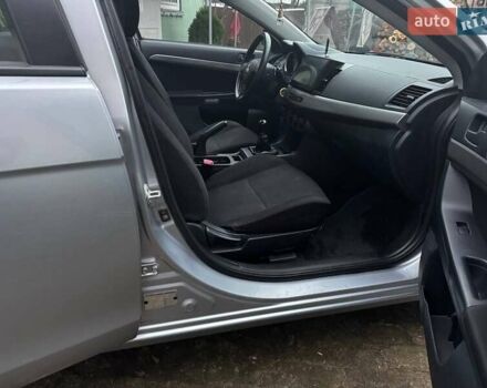 Серый Мицубиси Лансер, объемом двигателя 1.5 л и пробегом 147 тыс. км за 6700 $, фото 11 на Automoto.ua