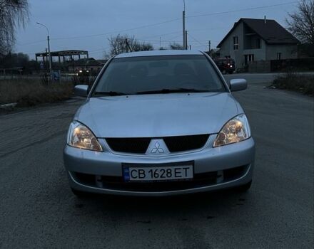 Сірий Міцубісі Lancer, об'ємом двигуна 1.6 л та пробігом 180 тис. км за 3900 $, фото 7 на Automoto.ua