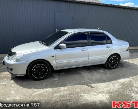 Сірий Міцубісі Lancer, об'ємом двигуна 1.6 л та пробігом 193 тис. км за 4500 $, фото 2 на Automoto.ua
