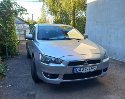 Серый Мицубиси Лансер, объемом двигателя 2 л и пробегом 103 тыс. км за 7700 $, фото 2 на Automoto.ua