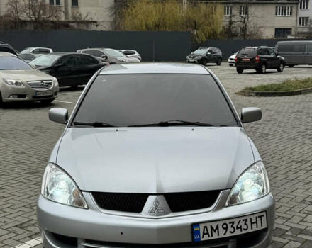 Сірий Міцубісі Lancer, об'ємом двигуна 1.6 л та пробігом 269 тис. км за 3999 $, фото 5 на Automoto.ua