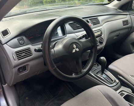 Мицубиси Лансер 2008 в Днепре (Днепропетровске) на Automoto.ua Серый Мицубиси Лансер, объемом двигателя 1.3 л и пробегом 220 тыс. км за 6000 $, фото 7 на Automoto.ua