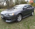 Сірий Міцубісі Lancer, об'ємом двигуна 1.47 л та пробігом 243 тис. км за 6200 $, фото 1 на Automoto.ua