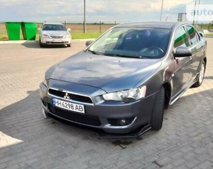 Сірий Міцубісі Lancer, об'ємом двигуна 2 л та пробігом 221 тис. км за 7100 $, фото 23 на Automoto.ua