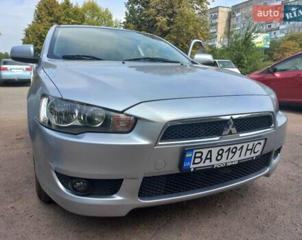 Серый Мицубиси Лансер, объемом двигателя 2 л и пробегом 103 тыс. км за 7700 $, фото 1 на Automoto.ua