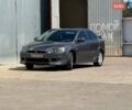 Серый Мицубиси Лансер, объемом двигателя 1.5 л и пробегом 224 тыс. км за 6300 $, фото 1 на Automoto.ua