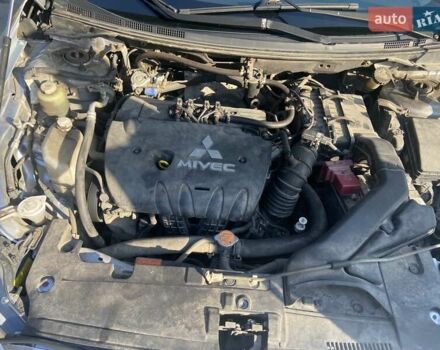 Серый Мицубиси Лансер, объемом двигателя 2 л и пробегом 266 тыс. км за 7000 $, фото 12 на Automoto.ua