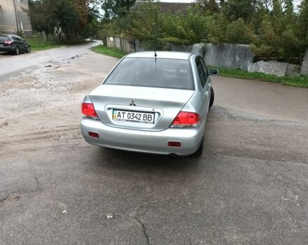 Сірий Міцубісі Lancer, об'ємом двигуна 1.6 л та пробігом 224 тис. км за 3100 $, фото 4 на Automoto.ua