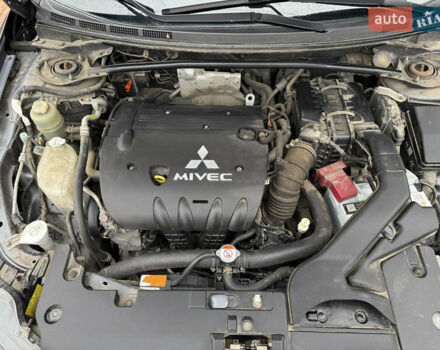 Сірий Міцубісі Lancer, об'ємом двигуна 2 л та пробігом 92 тис. км за 8200 $, фото 47 на Automoto.ua