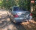 Сірий Міцубісі Lancer, об'ємом двигуна 1.6 л та пробігом 290 тис. км за 3850 $, фото 5 на Automoto.ua