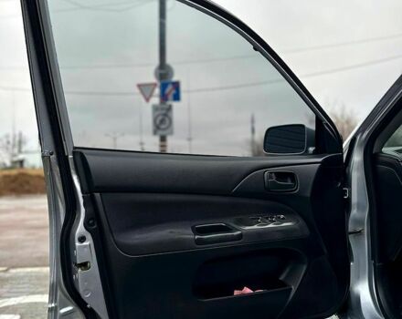 Серый Мицубиси Лансер, объемом двигателя 1.6 л и пробегом 165 тыс. км за 4000 $, фото 6 на Automoto.ua