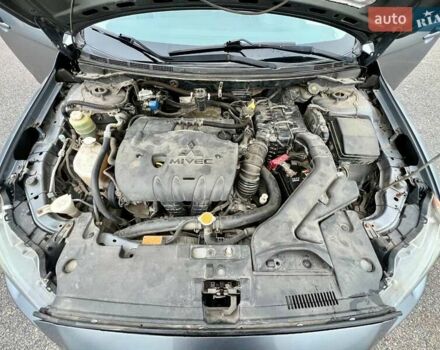 Серый Мицубиси Лансер, объемом двигателя 2 л и пробегом 203 тыс. км за 4999 $, фото 19 на Automoto.ua