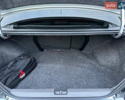 Серый Мицубиси Лансер, объемом двигателя 1.58 л и пробегом 34 тыс. км за 7500 $, фото 54 на Automoto.ua