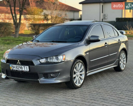 Сірий Міцубісі Lancer, об'ємом двигуна 2 л та пробігом 92 тис. км за 9800 $, фото 99 на Automoto.ua