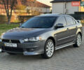 Сірий Міцубісі Lancer, об'ємом двигуна 2 л та пробігом 92 тис. км за 9800 $, фото 99 на Automoto.ua