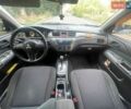 Сірий Міцубісі Lancer, об'ємом двигуна 1.58 л та пробігом 182 тис. км за 4650 $, фото 7 на Automoto.ua