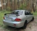 Серый Мицубиси Лансер, объемом двигателя 1.6 л и пробегом 270 тыс. км за 4599 $, фото 1 на Automoto.ua