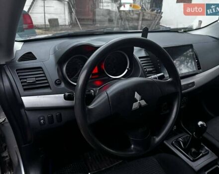 Серый Мицубиси Лансер, объемом двигателя 1.5 л и пробегом 147 тыс. км за 6700 $, фото 16 на Automoto.ua