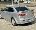 Сірий Міцубісі Lancer, об'ємом двигуна 2 л та пробігом 183 тис. км за 6999 $, фото 5 на Automoto.ua