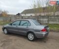 Сірий Міцубісі Lancer, об'ємом двигуна 1.58 л та пробігом 1 тис. км за 2850 $, фото 3 на Automoto.ua
