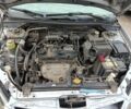 Сірий Міцубісі Lancer, об'ємом двигуна 1.6 л та пробігом 329 тис. км за 1506 $, фото 2 на Automoto.ua