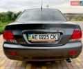 Сірий Міцубісі Lancer, об'ємом двигуна 1.6 л та пробігом 23 тис. км за 8333 $, фото 31 на Automoto.ua