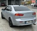 Серый Мицубиси Лансер, объемом двигателя 1.5 л и пробегом 234 тыс. км за 4599 $, фото 1 на Automoto.ua