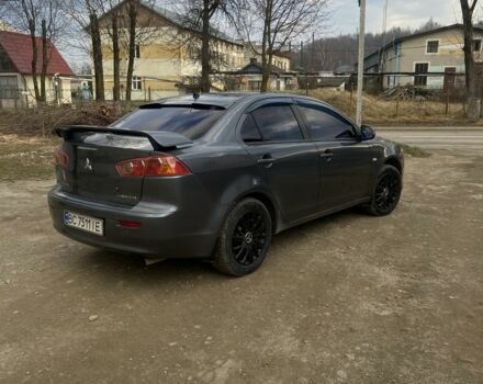 Сірий Міцубісі Lancer, об'ємом двигуна 2 л та пробігом 220 тис. км за 5750 $, фото 4 на Automoto.ua