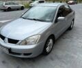 Сірий Міцубісі Lancer, об'ємом двигуна 1.6 л та пробігом 131 тис. км за 4300 $, фото 2 на Automoto.ua