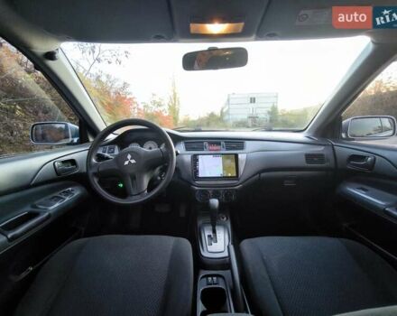 Серый Мицубиси Лансер, объемом двигателя 1.58 л и пробегом 145 тыс. км за 4800 $, фото 4 на Automoto.ua