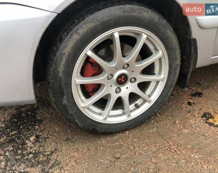 Серый Мицубиси Лансер, объемом двигателя 1.58 л и пробегом 268 тыс. км за 3450 $, фото 7 на Automoto.ua