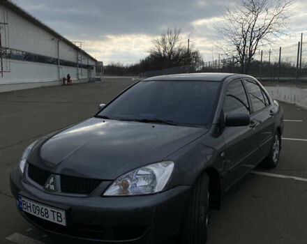 Сірий Міцубісі Lancer, об'ємом двигуна 1.58 л та пробігом 293 тис. км за 4350 $, фото 2 на Automoto.ua