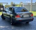 Сірий Міцубісі Lancer, об'ємом двигуна 1.6 л та пробігом 237 тис. км за 4499 $, фото 5 на Automoto.ua