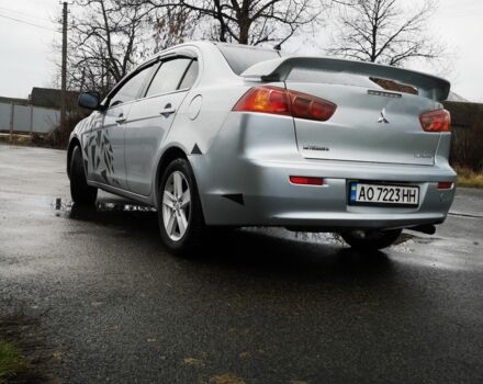 Серый Мицубиси Лансер, объемом двигателя 2 л и пробегом 260 тыс. км за 5200 $, фото 7 на Automoto.ua