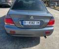 Серый Мицубиси Лансер, объемом двигателя 1.58 л и пробегом 516 тыс. км за 3600 $, фото 3 на Automoto.ua