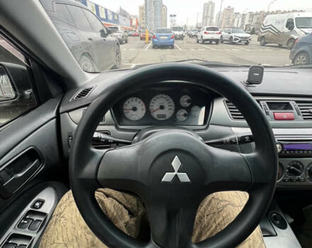 Серый Мицубиси Лансер, объемом двигателя 1.58 л и пробегом 183 тыс. км за 3800 $, фото 31 на Automoto.ua