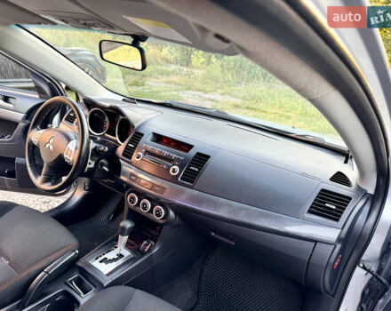Сірий Міцубісі Lancer, об'ємом двигуна 2 л та пробігом 223 тис. км за 7390 $, фото 18 на Automoto.ua