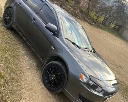 Сірий Міцубісі Lancer, об'ємом двигуна 2 л та пробігом 220 тис. км за 5750 $, фото 3 на Automoto.ua