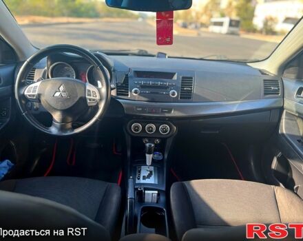 Серый Мицубиси Лансер, объемом двигателя 2 л и пробегом 151 тыс. км за 6099 $, фото 8 на Automoto.ua