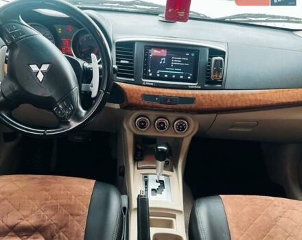 Сірий Міцубісі Lancer, об'ємом двигуна 2 л та пробігом 213 тис. км за 7300 $, фото 10 на Automoto.ua