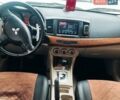 Сірий Міцубісі Lancer, об'ємом двигуна 2 л та пробігом 213 тис. км за 7300 $, фото 10 на Automoto.ua