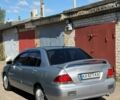 Серый Мицубиси Лансер, объемом двигателя 1.58 л и пробегом 320 тыс. км за 2799 $, фото 4 на Automoto.ua