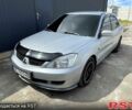 Сірий Міцубісі Lancer, об'ємом двигуна 1.6 л та пробігом 193 тис. км за 4500 $, фото 1 на Automoto.ua