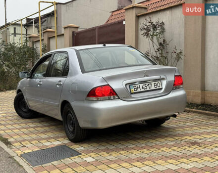 Сірий Міцубісі Lancer, об'ємом двигуна 1.6 л та пробігом 221 тис. км за 3650 $, фото 10 на Automoto.ua