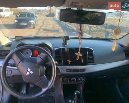 Серый Мицубиси Лансер, объемом двигателя 1.5 л и пробегом 160 тыс. км за 5300 $, фото 1 на Automoto.ua