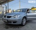 Сірий Міцубісі Lancer, об'ємом двигуна 1.6 л та пробігом 266 тис. км за 4300 $, фото 1 на Automoto.ua