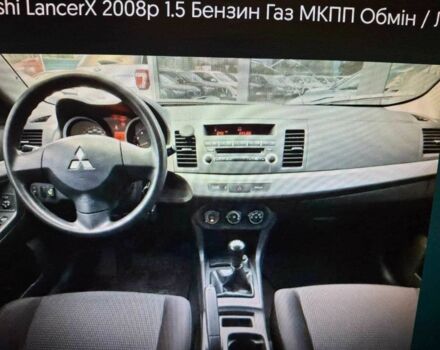 Серый Мицубиси Лансер, объемом двигателя 1.5 л и пробегом 235 тыс. км за 6500 $, фото 10 на Automoto.ua