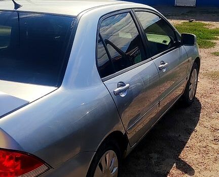 Серый Мицубиси Лансер, объемом двигателя 1.6 л и пробегом 212 тыс. км за 4000 $, фото 1 на Automoto.ua