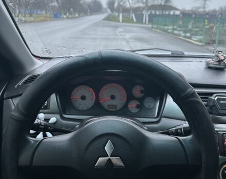 Сірий Міцубісі Lancer, об'ємом двигуна 1.6 л та пробігом 222 тис. км за 4300 $, фото 6 на Automoto.ua