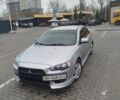 Серый Мицубиси Лансер, объемом двигателя 2 л и пробегом 220 тыс. км за 5700 $, фото 1 на Automoto.ua